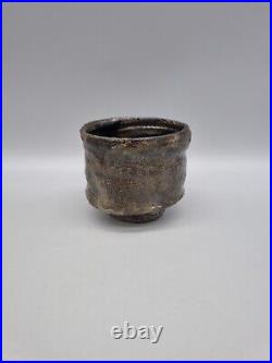 A Charles Bound Studio Pottery Footed Stoneware Yunomi In Black Glaze A Charles Bound Studio Pottery Footed Stoneware Yunomi In Black Glaze