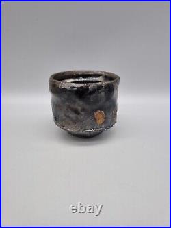 A Charles Bound Studio Pottery Footed Stoneware Yunomi In Black Glaze A Charles Bound Studio Pottery Footed Stoneware Yunomi In Black Glaze