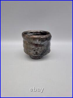 A Charles Bound Studio Pottery Footed Stoneware Yunomi In Black Glaze A Charles Bound Studio Pottery Footed Stoneware Yunomi In Black Glaze