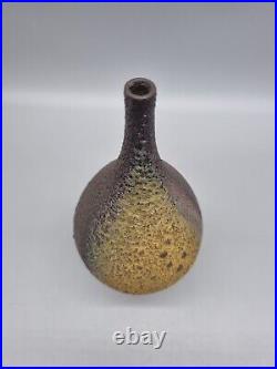 A Small Studio Pottery Vase / Vessel With Lava Glaze By Jon Bull A Small Studio Pottery Vase / Vessel With Lava Glaze By Jon Bull