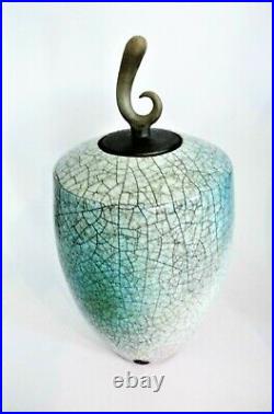 A Tim Andrews raku glazed vase and cover 30cm tall