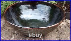 Edward Hughes studio pottery stoneware large fluted bowl, tenmoku glaze