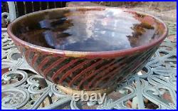 Edward Hughes studio pottery very large stoneware wrythen bowl, ame glaze