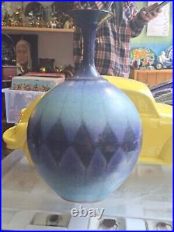 Gorgeous slim blue vase studio signed