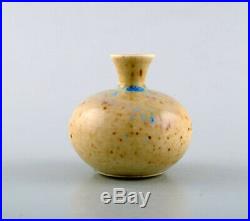 Gustavsberg Studio Hand. Miniature vase. Beautiful glaze in bright earth shades