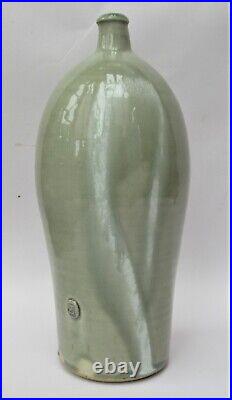 James Hake, British studio pottery celadon glazed tall bottle vase