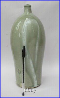 James Hake, British studio pottery celadon glazed tall bottle vase