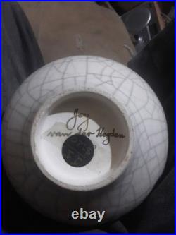 Jay van der Heyden signed studio pottery vase, crackle glaze with brass work