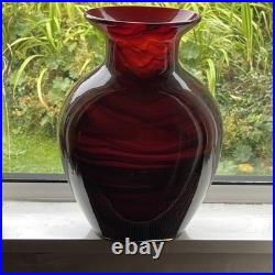 Large cased studio glass vase in rich Ruby Red with a dark Swirl pattern