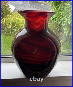 Large cased studio glass vase in rich Ruby Red with a dark Swirl pattern