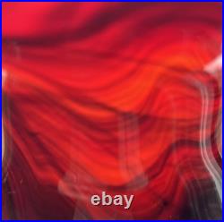 Large cased studio glass vase in rich Ruby Red with a dark Swirl pattern