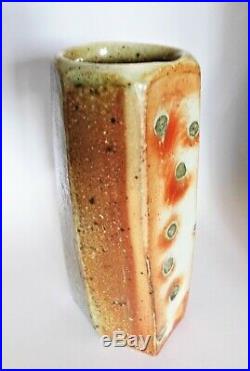 Lisa Hammond, a stoneware faceted vase with soda glaze