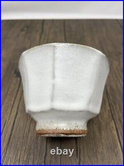 Phil Rogers stoneware tea bowl (yunomi) cream glaze with cut sides