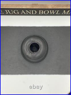 Studio Pottery Dan Kelly (b. 1953) Cylindrical vessel with black glaze Studio Pottery Dan Kelly (b. 1953) Cylindrical vessel with black glaze