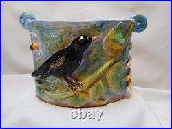Studio pottery earthenware vase handmade sunflower blackbird bees relief design Studio pottery earthenware vase handmade sunflower blackbird bees relief design