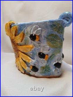 Studio pottery earthenware vase handmade sunflower blackbird bees relief design Studio pottery earthenware vase handmade sunflower blackbird bees relief design