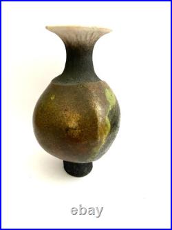 Studio pottery vase with potters mark 21.5 cm tall