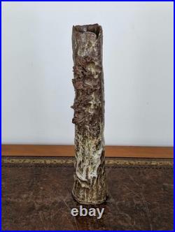 Tall British studio pottery sculpture with volcanic glaze and brutalist organic