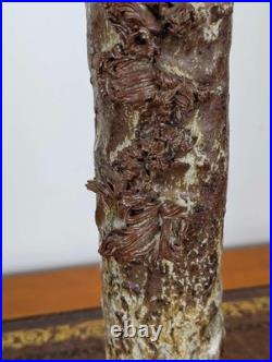 Tall British studio pottery sculpture with volcanic glaze and brutalist organic