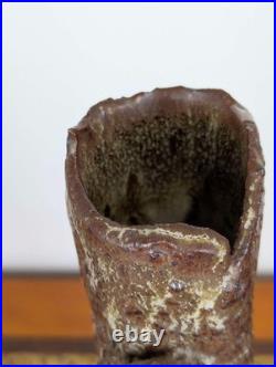Tall British studio pottery sculpture with volcanic glaze and brutalist organic