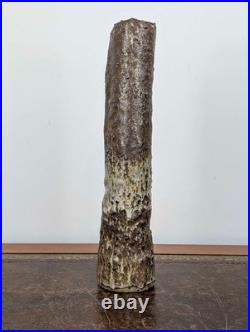 Tall British studio pottery sculpture with volcanic glaze and brutalist organic