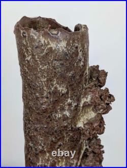 Tall British studio pottery sculpture with volcanic glaze and brutalist organic