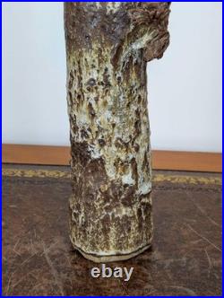 Tall British studio pottery sculpture with volcanic glaze and brutalist organic